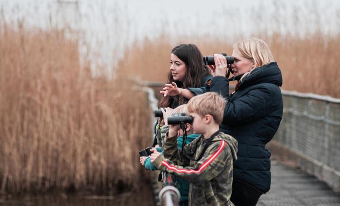 Family on bridge - Image credit: Dakeney Fox Photography